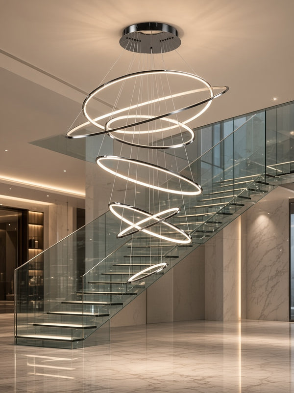 Floating LED Rings Chandelier above a staircase