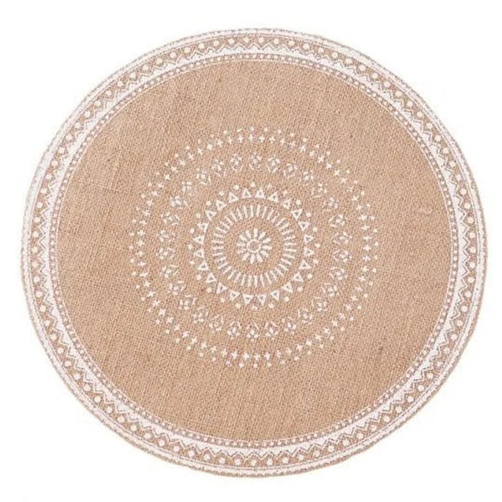 Arvi Embroidered Table Mat in white, 38cm on a white background