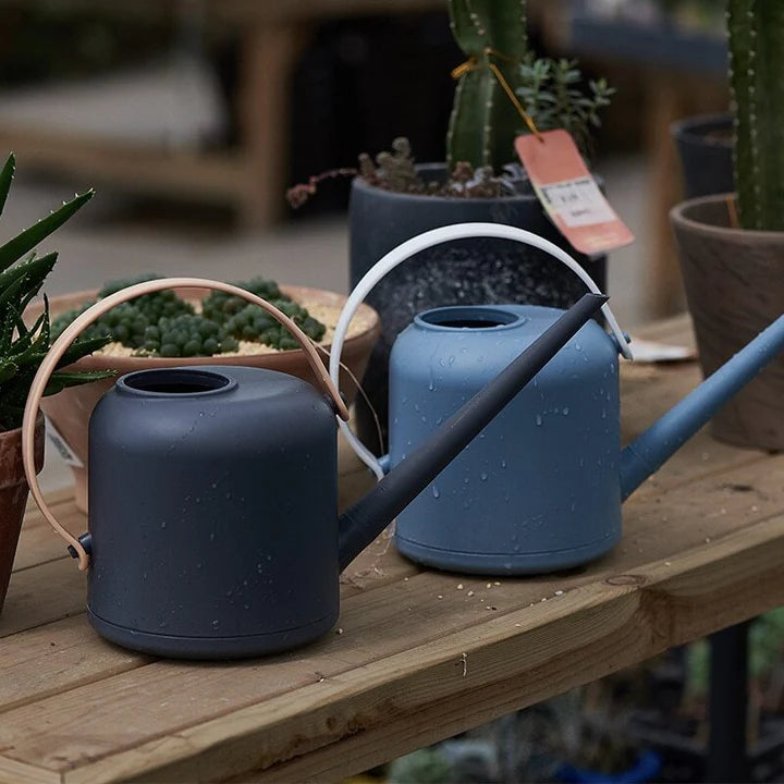 Long Neck Watering Can in a garden