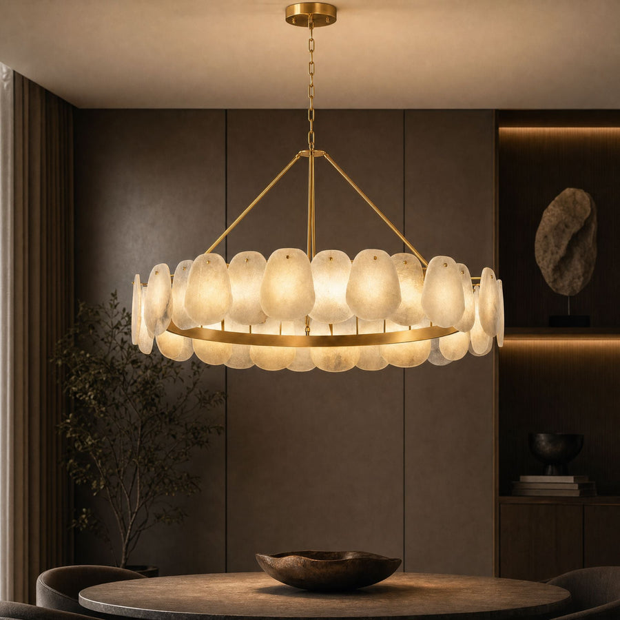 Alabaster and Brass Round Chandelier above a dining table