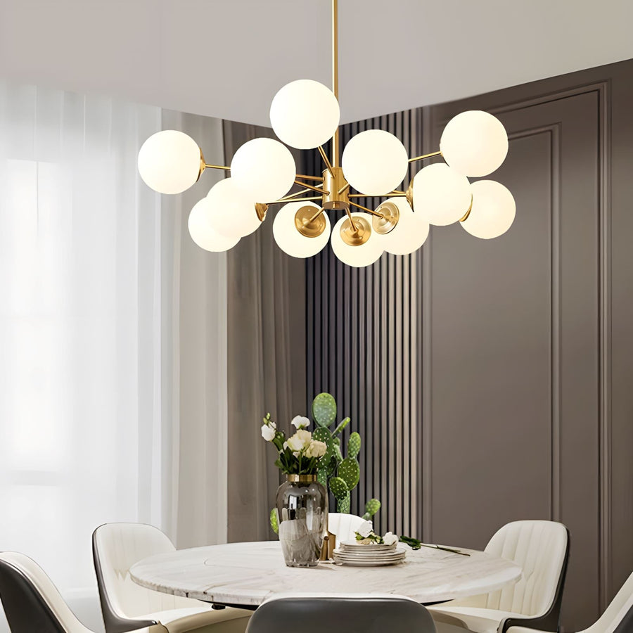 Brass Sputnik Opal Globe Chandelier above a dining table