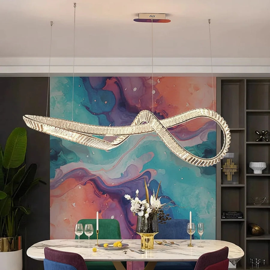 Crystal Linear Chandelier with Remote above a dining table