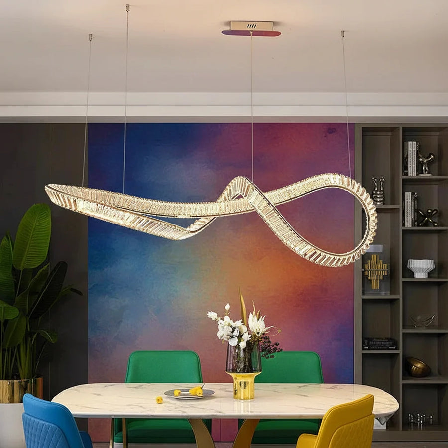 Crystal Linear Chandelier with Remote above a dining table