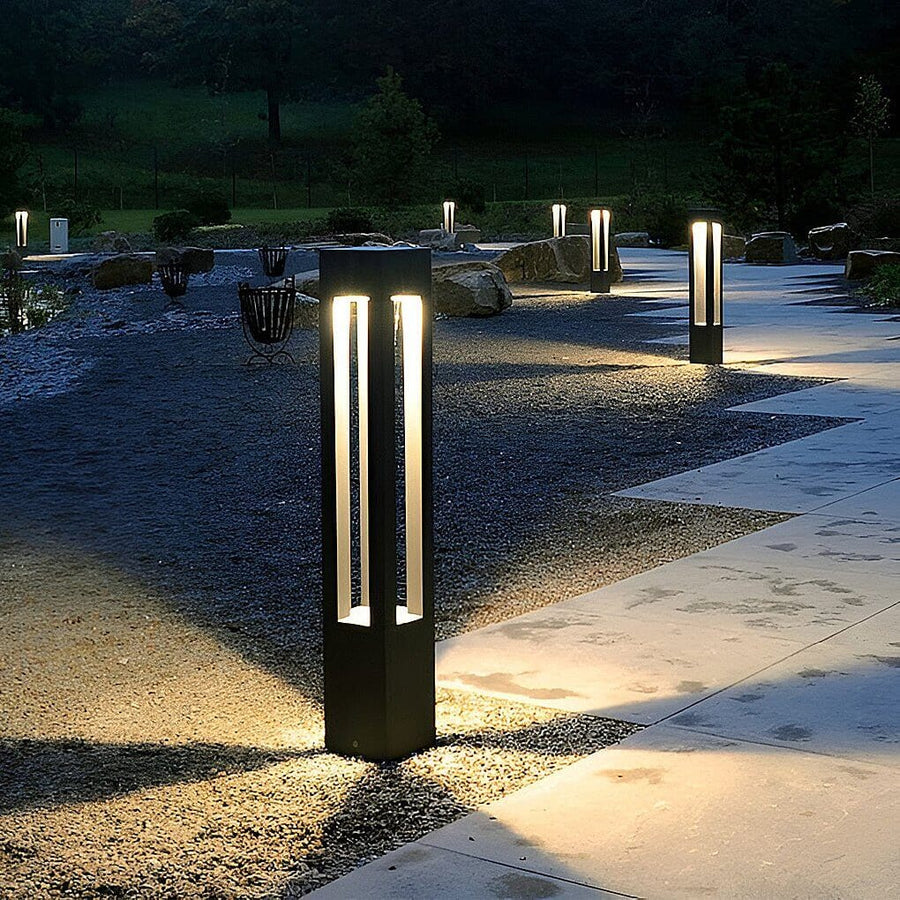 Four-Beam LED Garden Bollard Light along a garden path