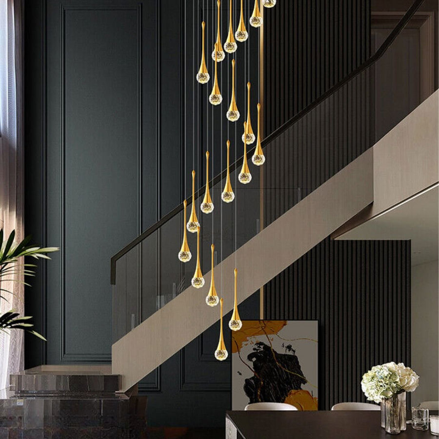 Glass Teardrop Pendant Cluster Chandelier above a staircase