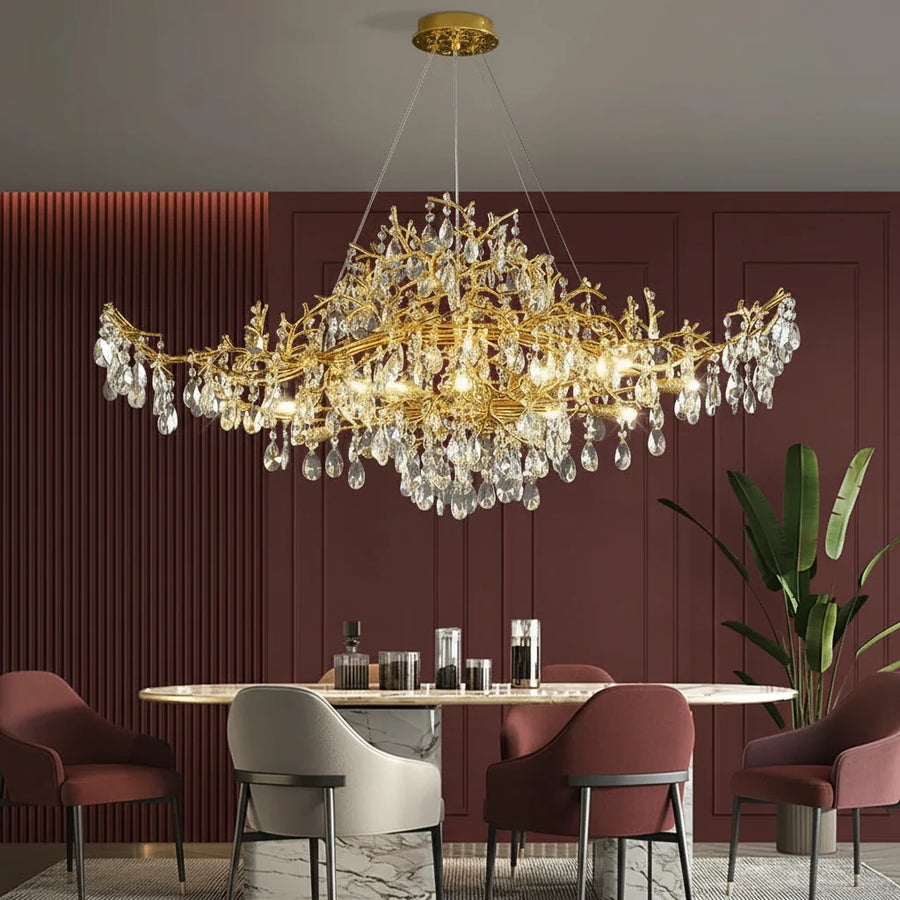 Gold Crystal Branch Linear Chandelier above a dining table