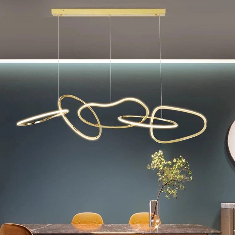 Interlinked Rings LED Linear Chandelier above a dining table