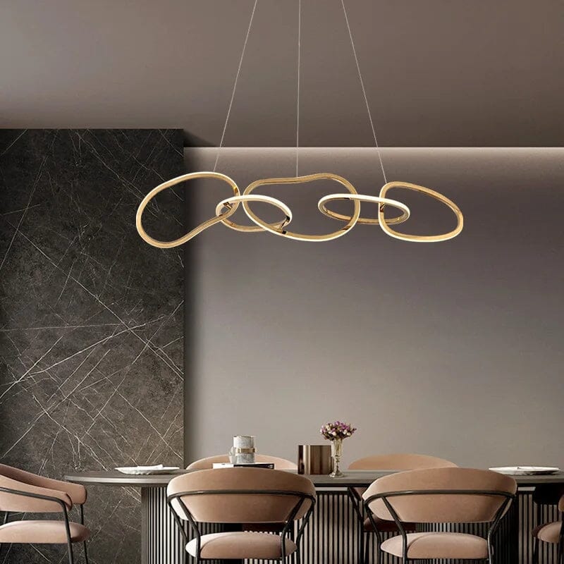 Interlinked Rings LED Linear Chandelier above a dining table