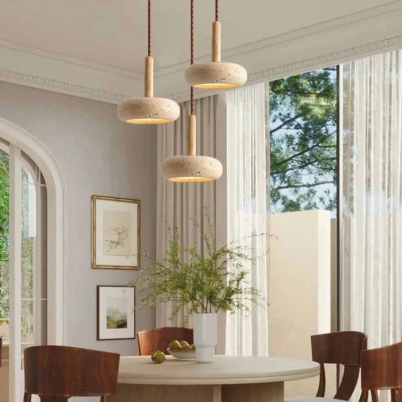 Japanese Stone and Wood Pendant Light above a dining table