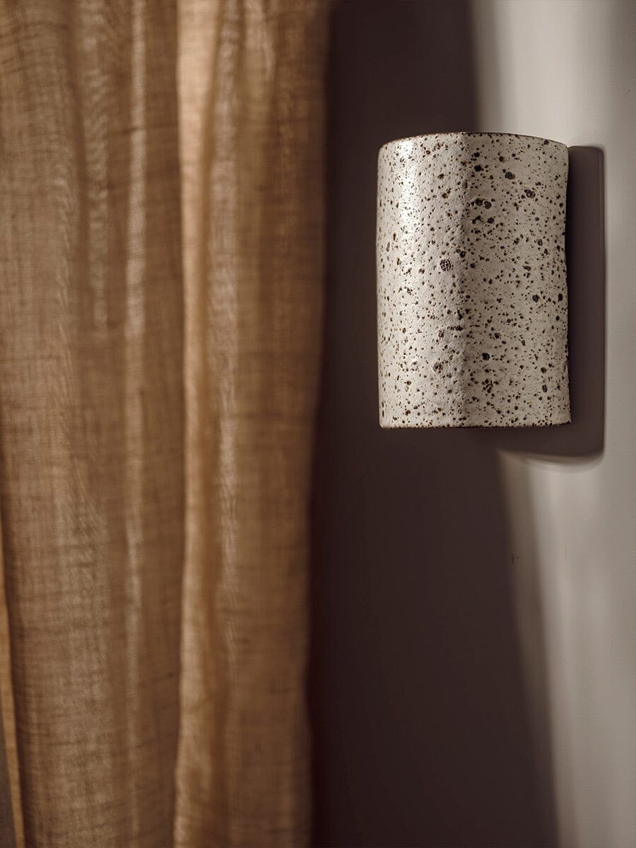 Outdoor Stone Look Cylinder Wall Lamp on an exterior wall