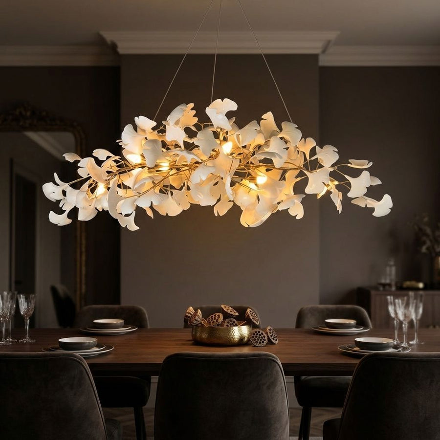 Porcelain Ginkgo Leaf Linear Chandelier above a dining table