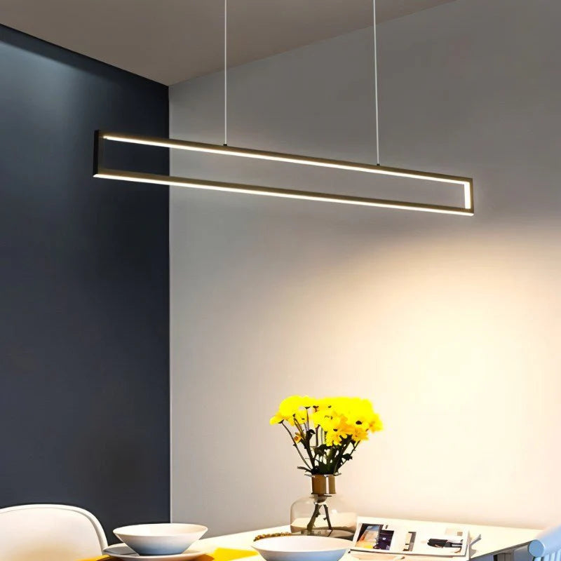 Elegant Radiant Showcase Chandeliers above a dining table