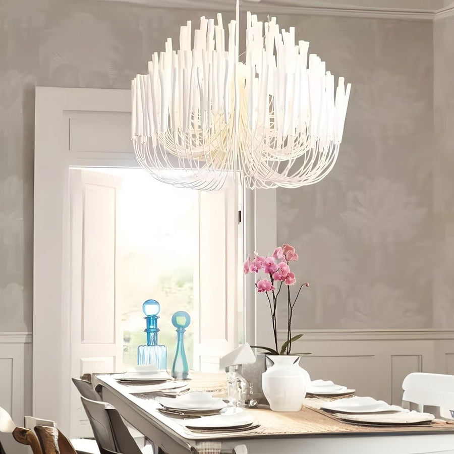 White Wood Stick Iron Chandelier above a dining table