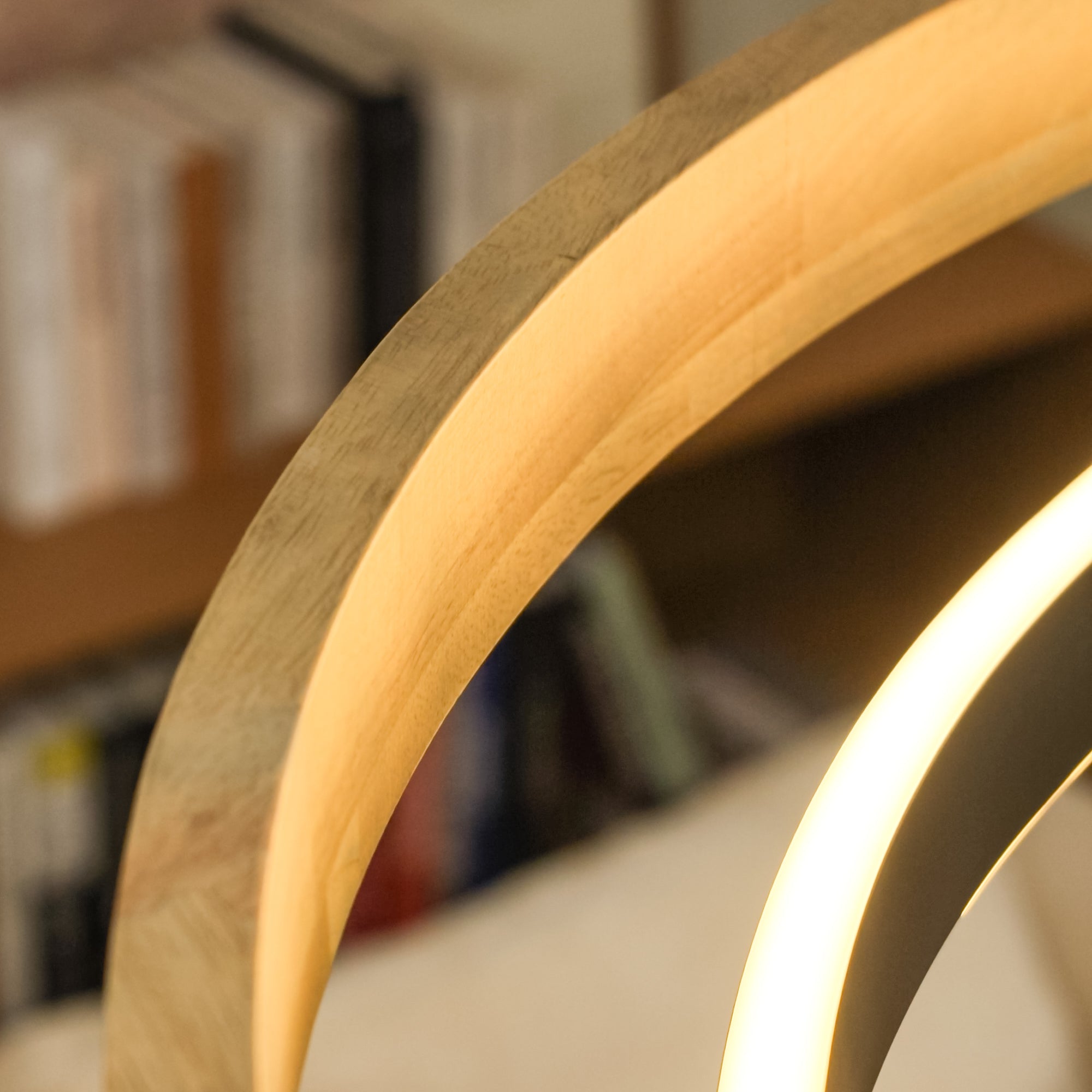Close-up detail of the Wood and Acrylic Concentric Ring LED Chandelier